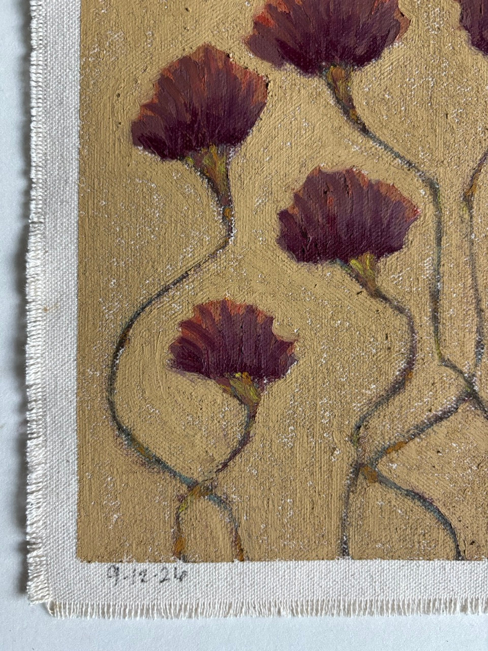 A close-up of a textured canvas painting featuring dark burgundy-purple flowers with thin dark stems on a warm beige background, finished with a white frayed edge.
