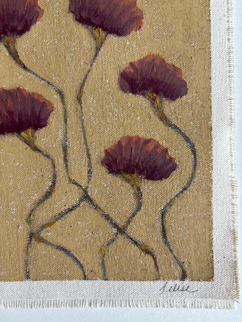 A close-up of a textured painting featuring dark burgundy flowers with wavy stems on a warm beige background, finished with a white canvas border and a visible artist signature in the lower right.